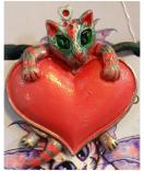 AzureGreen: kitten with heart pendant