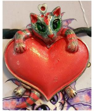AzureGreen: kitten with heart pendant