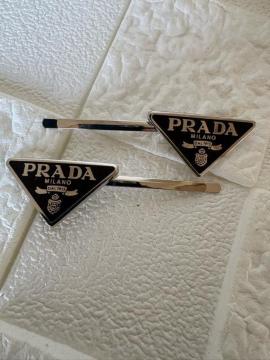 PRADABe[WwAs ubNQ_Zbg