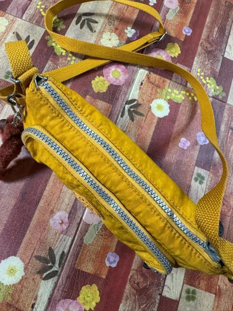 ӂ߂āKIPLINGV_[obNJWAnZbgAbv1000~X^[g