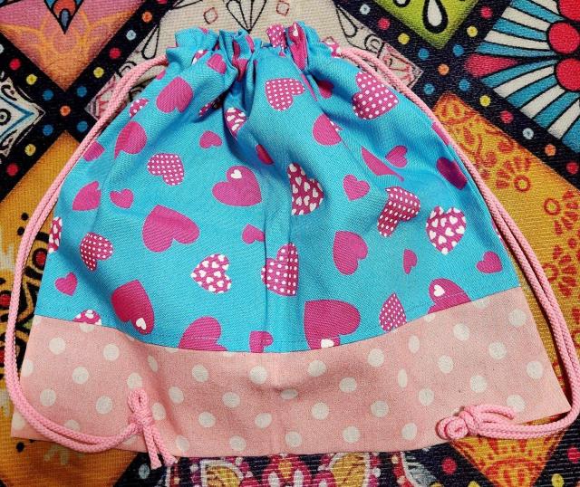 水色生地に可愛いハート柄と薄ピンク生地に白色水玉模様の生地を縫い合わせた巾着です。 < ペット/手芸/園芸 水色生地に可愛いハート柄と薄ピンク生地に白色水玉模様の生地を縫い合わせた巾着です。 < ペット/手芸/園芸の