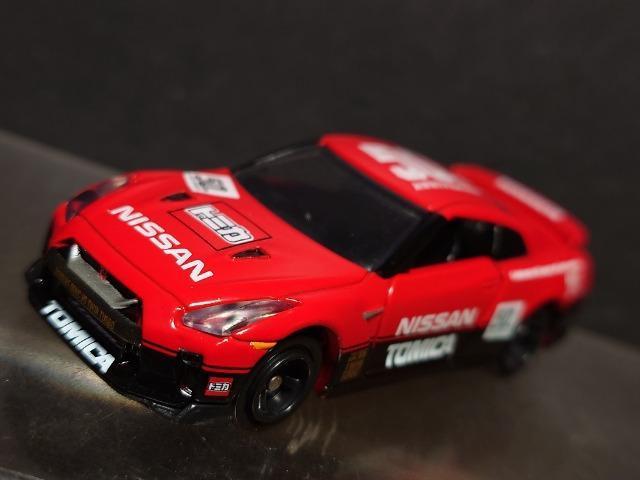 g~JTONLOdldesigned by mhrr`mYfs-q