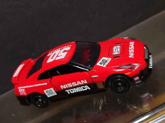 g~JTONLOdldesigned by mhrr`mYfs-q