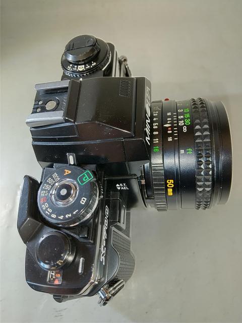 MINOLTA X-700  i + MD 50mm 1:1.7 + MC 135mm 1:2.8  Ɠd/AV 