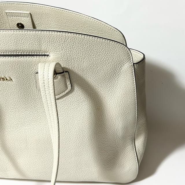 i FURLA t W_ U[ g[gobO V_[ eʎ[  uh 