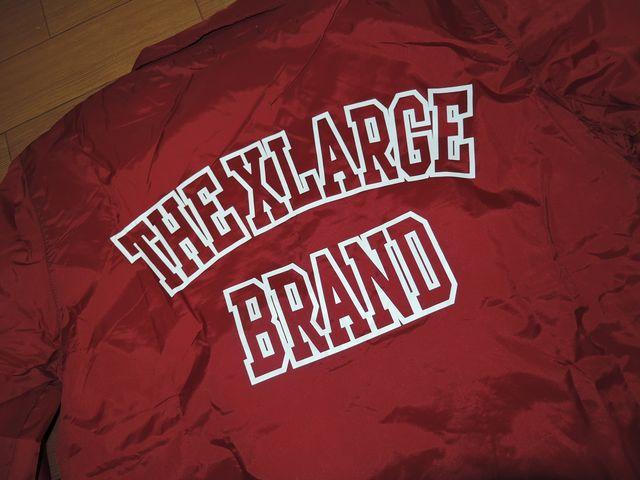 新品エクストララージXLARGEナイロンコーチジャケットLカレッジ < ブランド  新品エクストララージXLARGEナイロンコーチジャケットLカレッジ < ブランドの