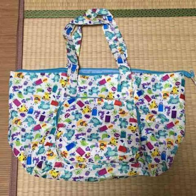 ディズニー・ポケッタブルトートバッグ。モンスターズインク柄白 < ブランド  ディズニー・ポケッタブルトートバッグ。モンスターズインク柄白 < ブランドの