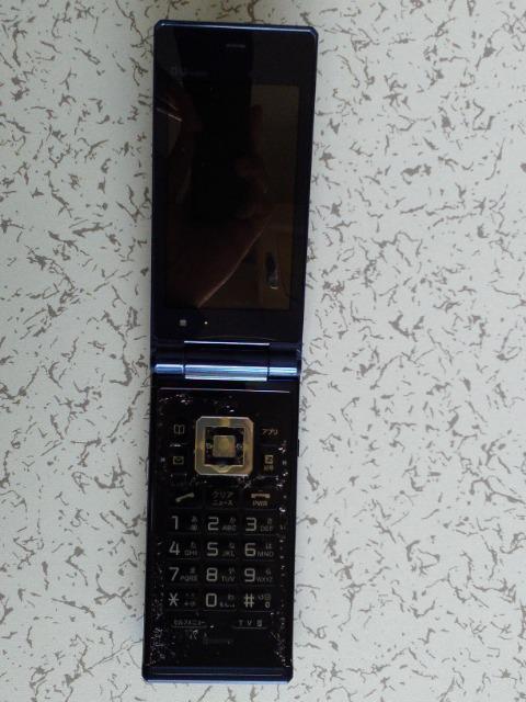 au K009(�{��+�o�b�e���[) �� �Ɠd/AV�� 