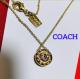COACH �I�[�v���T�[�N�� �l�b�N���X (�S�[���h)