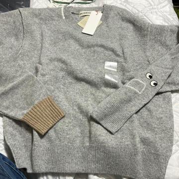ViUNIQLOv~AN[lbNZ[^[O[k