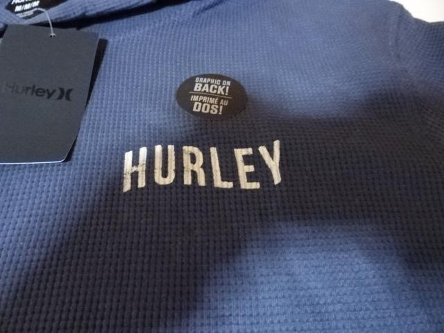 【HURLEY】 バックプリントあり フード ポケット付 サーマル素材  ロングスリーブTシャツUS M < ブランド  【HURLEY】 バックプリントあり フード ポケット付 サーマル素材  ロングスリーブTシャツUS M < ブランドの