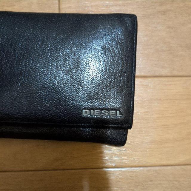 DIESEL(ディーゼル)のブラックレザーの二つ折りロングウォレットで < 男性ファッション DIESEL(ディーゼル)のブラックレザーの二つ折りロングウォレットで < 男性ファッションの