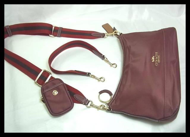 Kɔi@COACH@R[`@GXV_[obN@^CA205