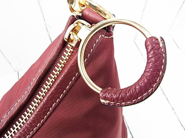 Kɔi@COACH@R[`@GXV_[obN@^CA205