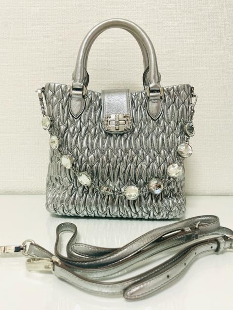 miumiuVo[NX^rW[nhobOV_[obO2way~E~EF   uh 