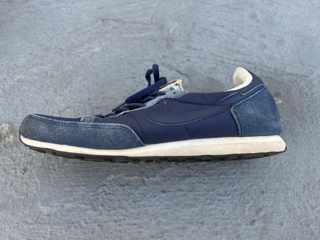 NIKEXj[J[  uh 