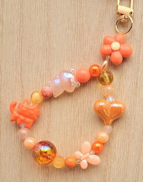 ME:I TSUZUMI �C�V���ہ@�L�[�z���_�[�@�I�����W �� �^�����g�O�b�Y�� 