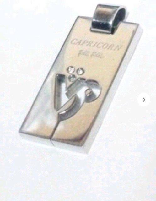 tHtH Folli Follie  CAPRICORN Rr y_g gbv 