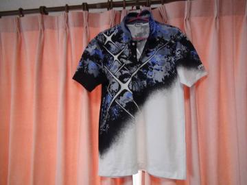 storiaの白黒のポロシャツ(L)!。