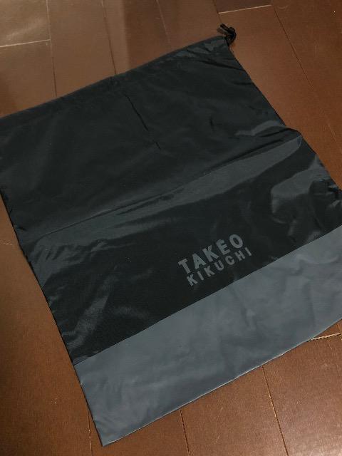 新品〈TAKEO KIKUCHI〉タケオ キクチ 巾着(ブラック×グレー)希少ノベルティ < ブランド  新品〈TAKEO KIKUCHI〉タケオ キクチ 巾着(ブラック×グレー)希少ノベルティ  < ブランドの