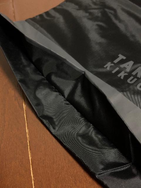 新品〈TAKEO KIKUCHI〉タケオ キクチ 巾着(ブラック×グレー)希少ノベルティ < ブランド  新品〈TAKEO KIKUCHI〉タケオ キクチ 巾着(ブラック×グレー)希少ノベルティ < ブランドの