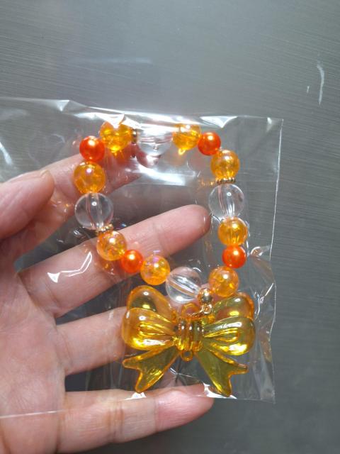 No.29新品★「デカッ!リボンチャーム付きブレスレット」=オレンジ= < キッズ/ベビー No.29新品★「デカッ!リボンチャーム付きブレスレット」=オレンジ= < キッズ/ベビーの