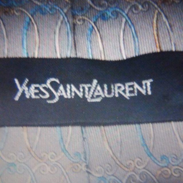 Yves Saint Laurent̃lN^C !B  uh 