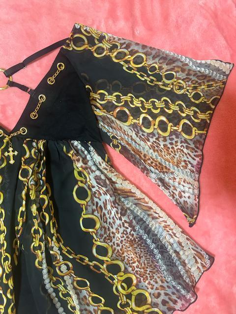 d.i.a. チェーン 豹柄シフォン 胸元背中深く空き チェーンチャーム バッククロス露出 ゴージャスフレアトップス 新品未使用 < ブランド  d.i.a. チェーン 豹柄シフォン 胸元背中深く空き チェーンチャーム バッククロス露出 ゴージャスフレアトップス 新品未使用 < ブランドの