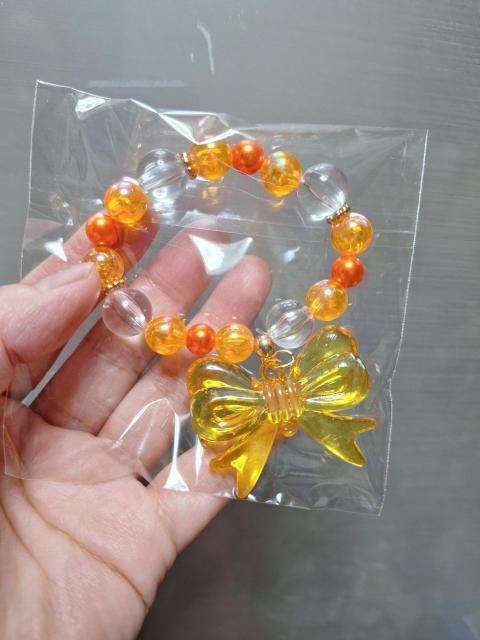 No.15新品★「デカッ!リボンチャーム付きブレスレット」=オレンジ= < キッズ/ベビー No.15新品★「デカッ!リボンチャーム付きブレスレット」=オレンジ= < キッズ/ベビーの