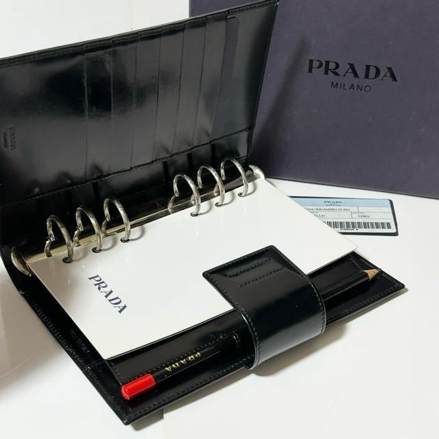 ���i PRADA �v���_ �A�h���X�� �蒠�P�[�X ���U�[ �u���b�N ���K�i �� �u�����h�� 