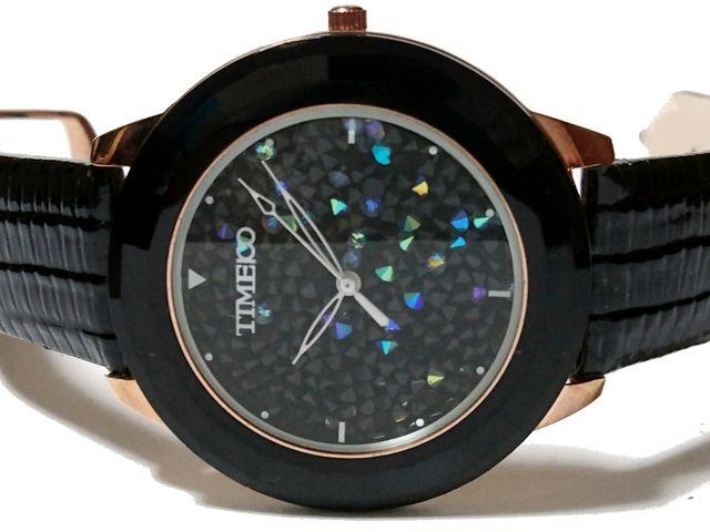 ɔi TIME100y1_́z^ Yrv