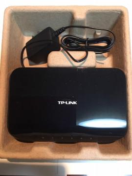 TP-LINKXCb`Onu TL-SG1005D