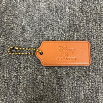 ���� Disney �~ COACH �f�B�Y�j�[ �R�[�` �^�O �`���[��