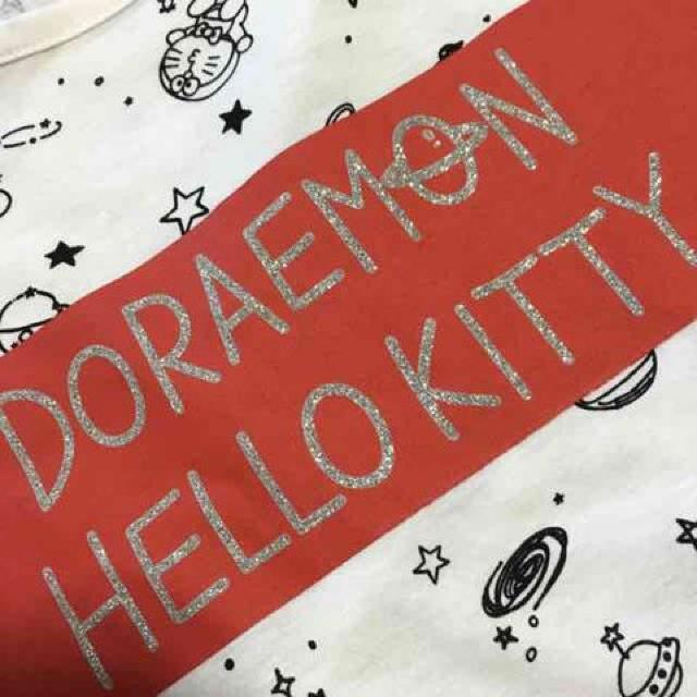 ハローキティ×ドラえもん・宇宙柄ドルマン袖カットソー白M < 女性ファッション  ハローキティ×ドラえもん・宇宙柄ドルマン袖カットソー白M < 女性ファッションの