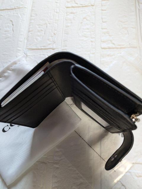 COACH��܂���z�V�O�l�`���[���{����