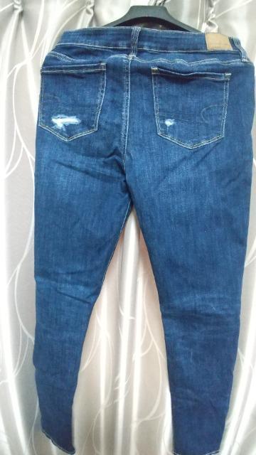 AMERICAN EAGLEのダメージジーンズ★ウエスト平置38cm < ブランド  AMERICAN EAGLEのダメージジーンズ★ウエスト平置38cm < ブランドの