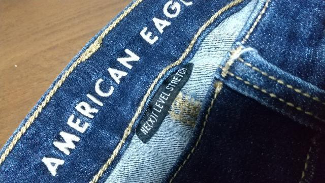AMERICAN EAGLEのダメージジーンズ★ウエスト平置38cm < ブランド  AMERICAN EAGLEのダメージジーンズ★ウエスト平置38cm < ブランドの