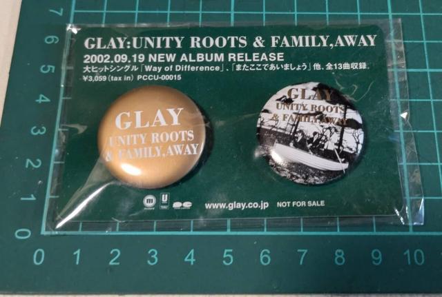GLAY�@�O���C�yUNITY ROOTS �� FAMILY.AWAY�z�ʃo�b�W�@�@�񔄕i  �� CD/DVD/�r�f�I�� 